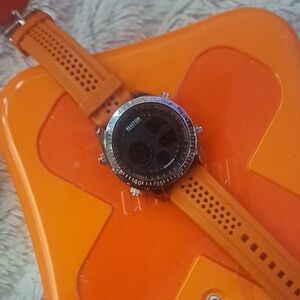 Vibrant Orange Smartwatch with Silver Bezel and Circular Display